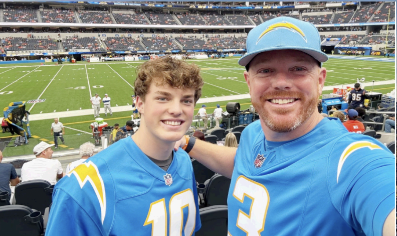 CADIN FETTERS '26 CHEERS on the Chargers with his father